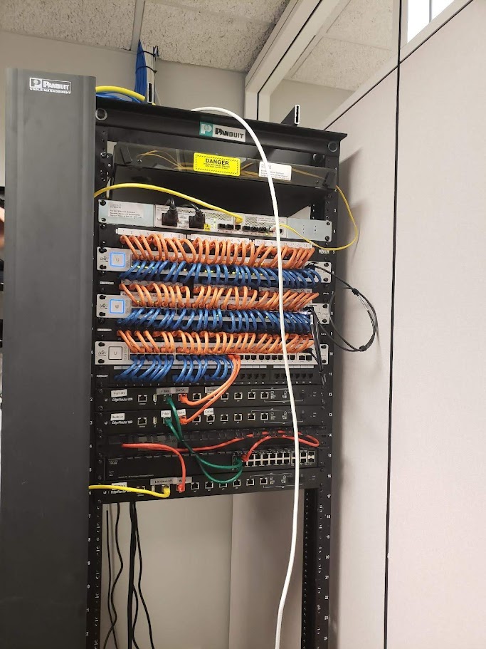 Clean, professionally organized network rack at a school