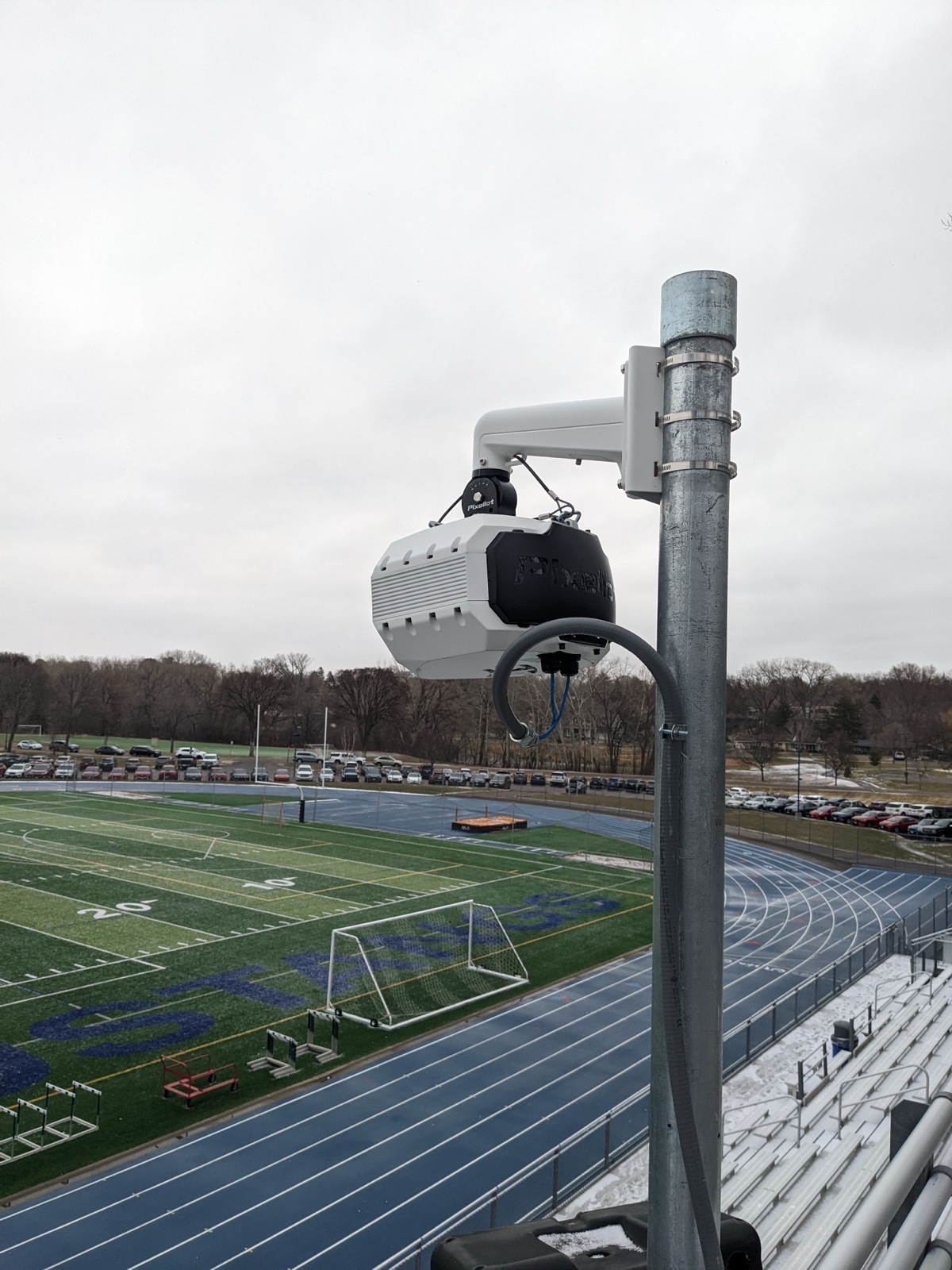 Ceiling-mounted networking hardware in a school